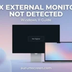 A laptop next to a dark external monitor showing a No Signal alert, set against a soft pastel corporate background with custom troubleshooting typography